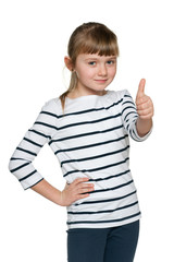 Young girl with her thumb up