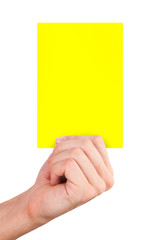 Hand Holding Yellow Card