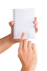 Hands Holding Notebook