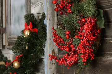 Naklejka na ściany i meble Christmas branch of a fur-tree on a wall