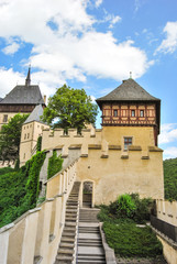 Fototapeta na wymiar Karlstejn castle on green hill, Prague