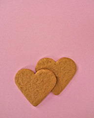 heart shaped cookies on pink background