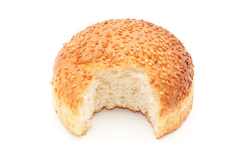 bun with sesame seeds on a white background