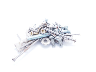 Nails, screws and nuts on a white background