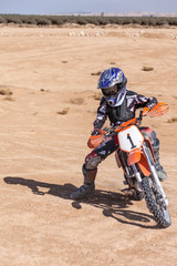 teenager on a motorbike