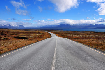 Fototapeta na wymiar Long and empty asphalt road in Iceland
