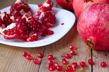 Fresh red pomegranates with seeds