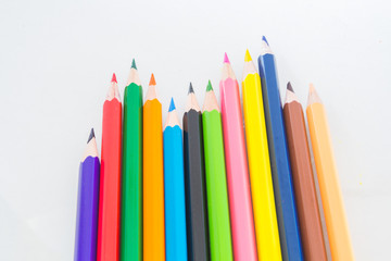 Colour pencils isolated on white background