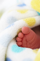 baby foot in blanket