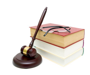 gavel, a stack of books and glasses on white background