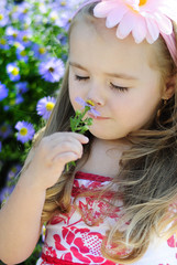 pretty little girl near colors