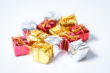 Decorative gifts on white background