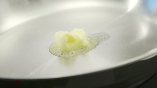 Butter melting in a hot pan