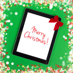 Merry Christmas message on tablet computer