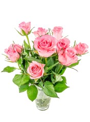 A bunch of pink roses in a glass vase on white background
