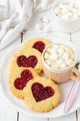 Homemade Cookies with Heart-Shaped Center and a Cup of Hot Choco