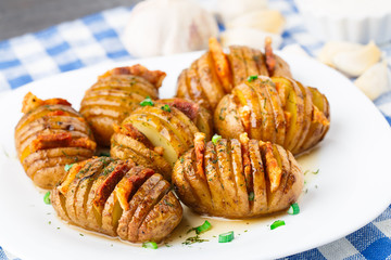 Accordion baked potatoes with bacon