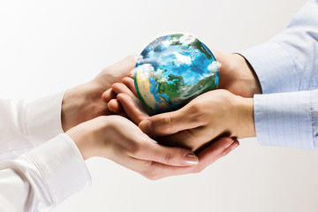 Earth planet in hands