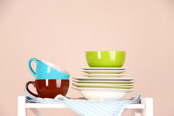 Beautiful white shelves with tableware and decor,