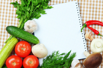 Cooking concept. Groceries with empty cookbook close up