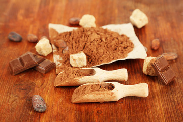 Cocoa powder on wooden table