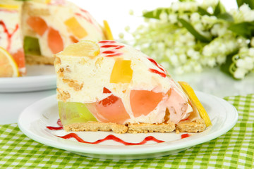 Delicious jelly cake on table close-up