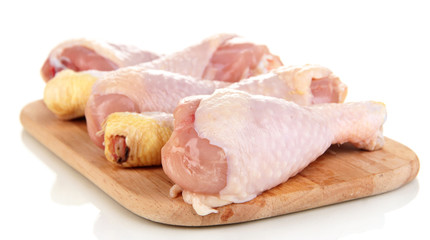Raw chicken legs isolated on white