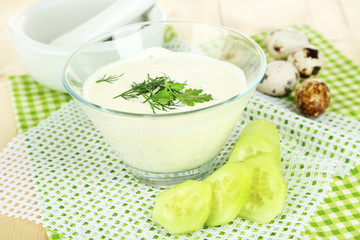 Cucumber yogurt in glass bowl,