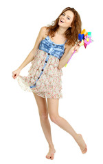 Beautiful young girl in dress isolated on white