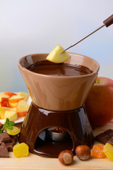 Chocolate fondue with fruits,