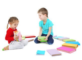 Little children with books isolated on white