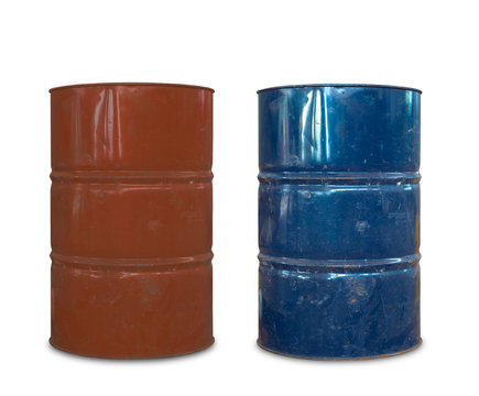 Rusty metal oil barrels on white background