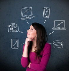Young woman thinking with drawn gadgets around her head