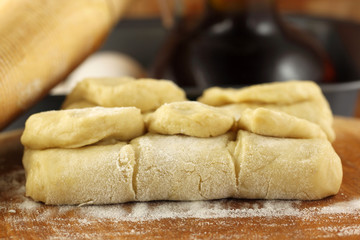 Flour dough with rolling pin