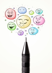 Smiley faces coming out of pen