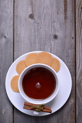 Cookies with cinnamon and cup of tea