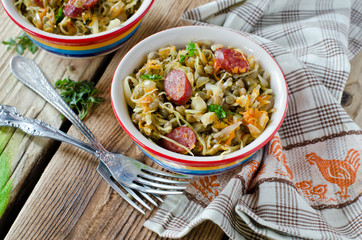 Cabbage stew with lentils and sausages