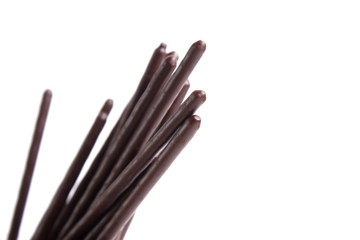Choc stick pile on white background