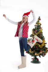 girl in boots in Christmas tree