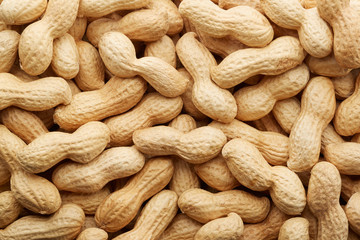 Peanuts in shell texture background - Powered by Adobe