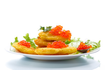 potato pancakes with red caviar
