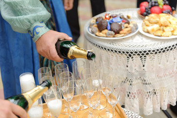 Filling Glasses with Champagne