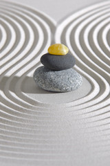 Japan zen garden with stones in raked sand