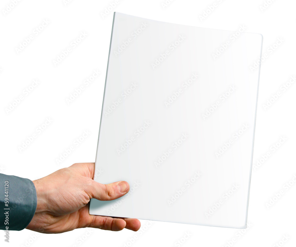 Wall mural blank magazine cover in the hand isolated on white