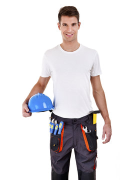 builder in a helmet over white background