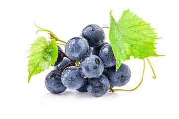 Ripe grapes with leaves, on white background
