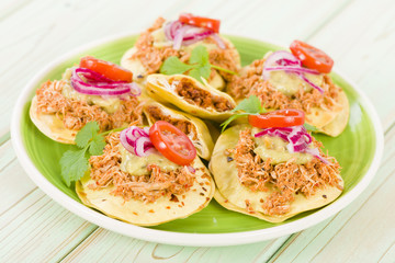 Panuchos - Mexican corn tortillas filled with refried beans