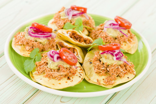 Panuchos - Mexican corn tortillas filled with refried beans