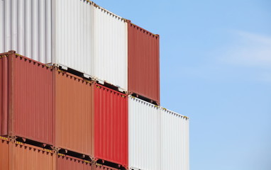 cargo containers in storage area of freight sea port terminal
