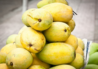 Barracuda yellow mango on market, Vietnam.